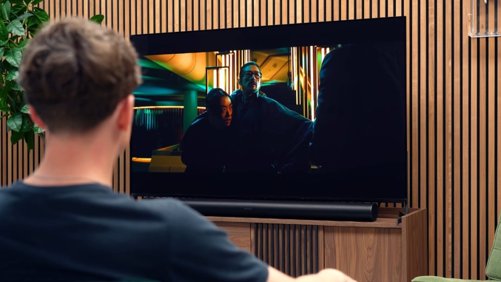 Man listening to Bravia 8 II